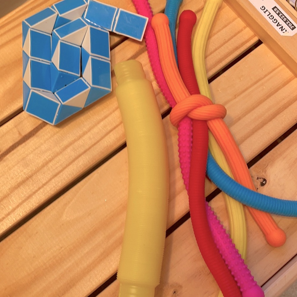 Yellow Pop tube,blues and white fidget snake and funky noodles